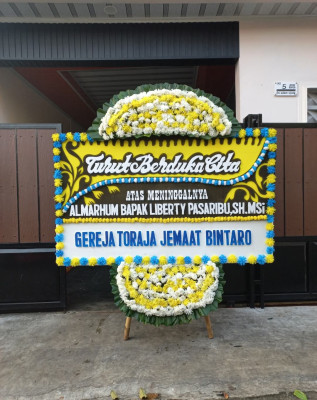 Papan Bunga Duka di Kunjang